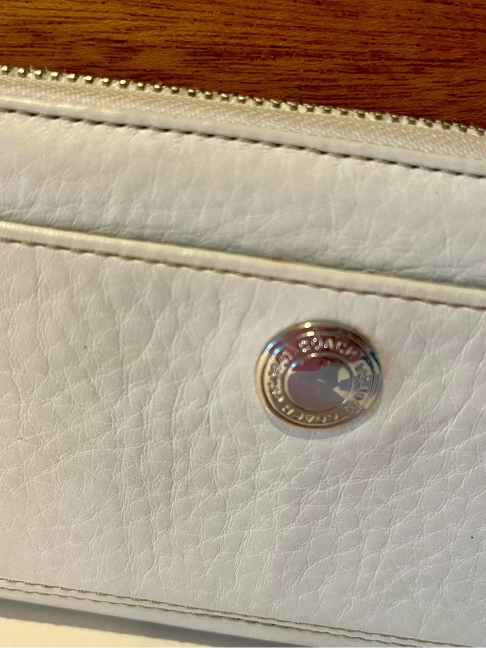 Coach white pebbled leather zip-around wallet